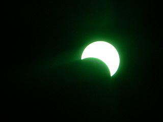 Partial solar eclipse viewed through a filter